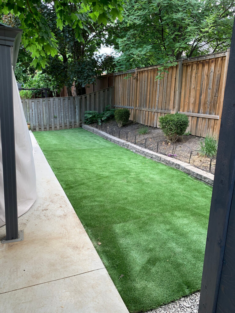 Turf laid along a narrow strip beside a house
