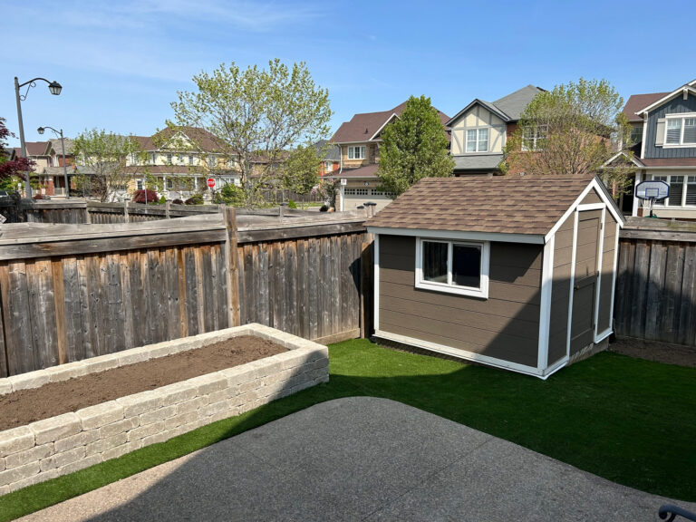A raised garden bed and shed